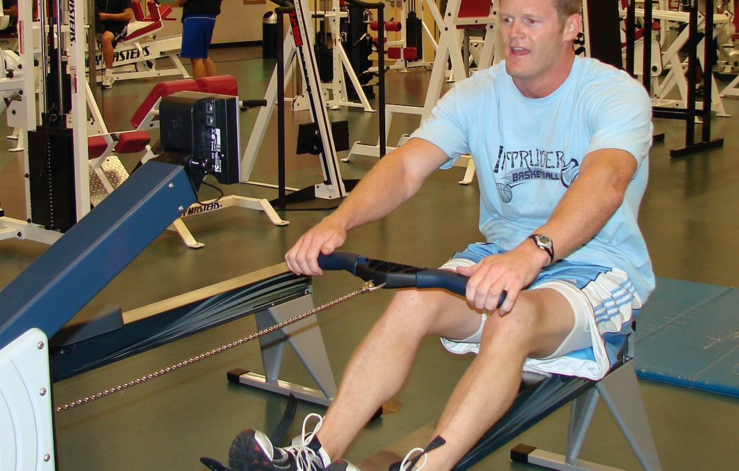exercise muscles with a rowing machine workout